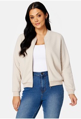 Happy Holly Hanna quilted bomber jacket 